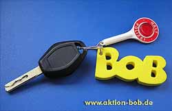 Autoschlüssel mit BOB-Anhänger und Polizeikelle